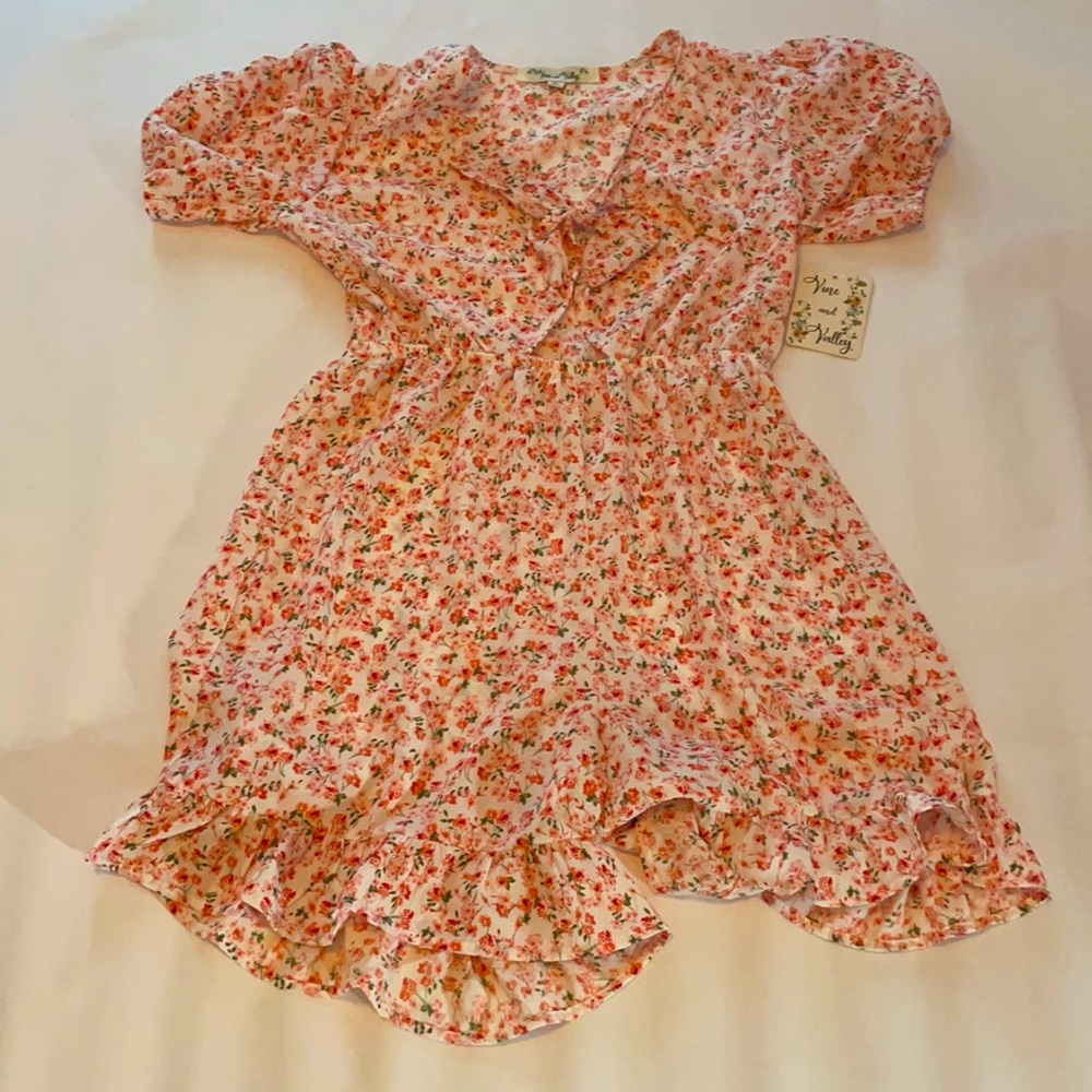 Pink and white Floral romper with bow